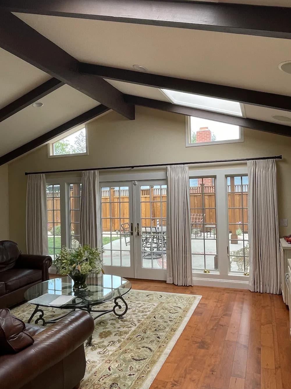 Drapes installation in a living room